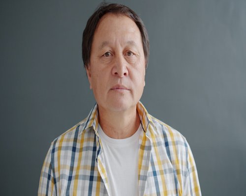Portrait of middle aged asian man